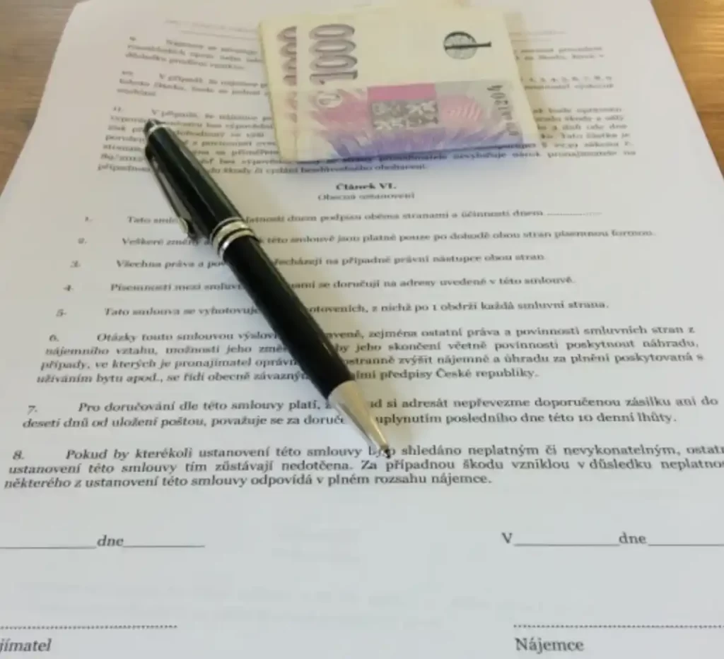 rental contract with cash and pen